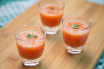 Gazpacho - cold tomato soup  portion glasses. Appetizer