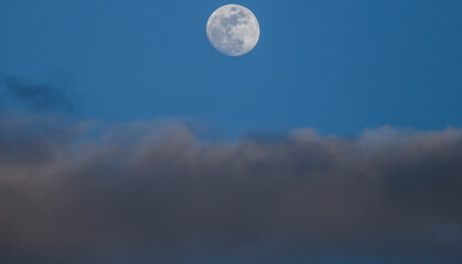 Naklejka na ściany i meble moon in the clouds