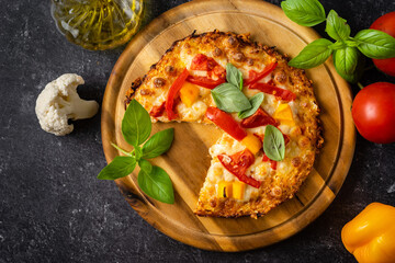 Top view of fresh and delicious keto pizza with cheesy cauliflower crust