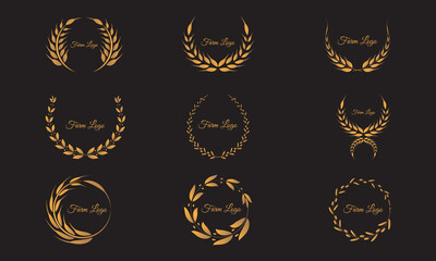 et of laurel wreaths on white background. Set of gold wreaths.