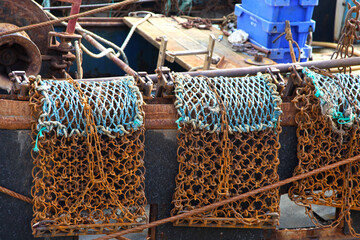 Clam or scallop drag nets on a fishing boat in Weymouth, Dorset, England