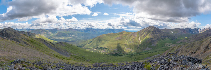 Obraz premium Panorama view of spectacular Tombstone Territorial Park located in Northern Canada, Yukon Territory during the summertime. 