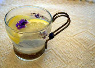 Delicious hot or cold beverage served with lemon and lavender