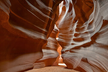 Slot Canyons, commonly found in arid areas such as Utah, Arizona and southwest USA are formed by water erosion typically in sandstone and are at risk of flash flooding