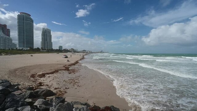 Strong wind from Hurricane Isaias generates heavy surf in South Beach in Miami Beach, Florida 4K.
