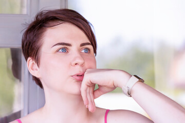 Portrait of a girl dreamily talking about something sublime