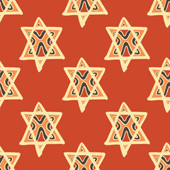 Seamless vector of tribal style motif star shape on pastel orange background