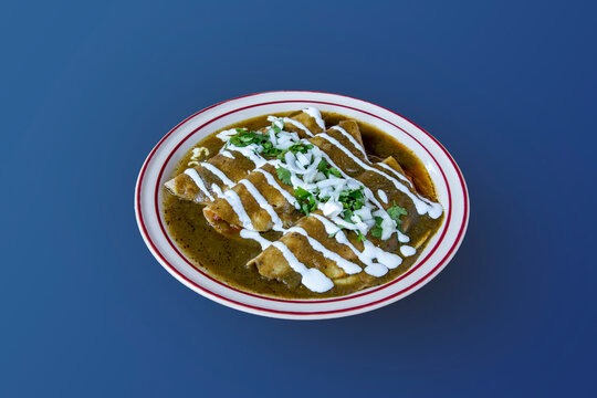 Green Enchiladas With Sour Cream As Mexican Breakfast