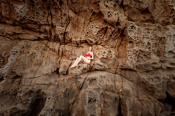 young woman in red bikini