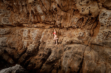 young woman in red bikini 