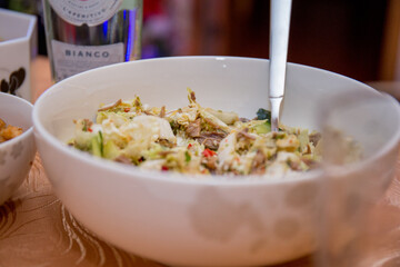 salads in dishes on the kitchen table
