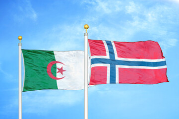 Fototapeta premium Algeria and Norway two flags on flagpoles and blue sky