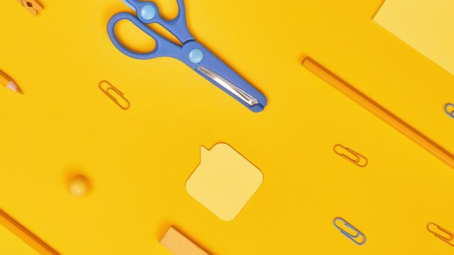wiring school items on a yellow background, close-up, flatley