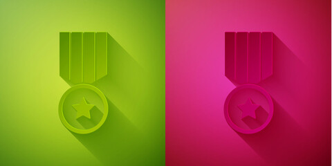 Paper cut Medal with star icon isolated on green and pink background. Winner achievement sign. Award medal. Paper art style. Vector.