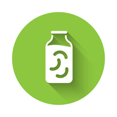 Fototapeta premium White Pickled cucumbers in a jar icon isolated with long shadow. Green circle button. Vector.