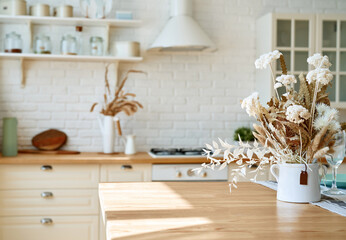 Kitchen wooden table top and kitchen blur background interior style scandinavian