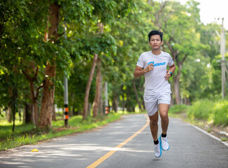 Asian men jogging and running in the park