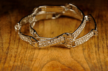 Diamond bangles on wooden background,  Indian Traditional jewelry