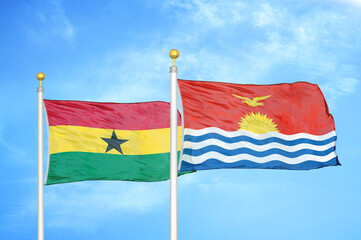 Ghana and Kiribati two flags on flagpoles and blue sky