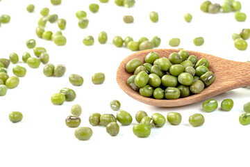 green mung beans with wooden spoon isolated on white background