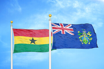 Ghana and Pitcairn Islands two flags on flagpoles and blue sky