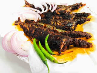 fish fry with sliced onion