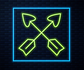 Glowing neon line Crossed arrows icon isolated on brick wall background. Vector.