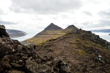 Fototapeta na wymiar Amazing view in Faroe Islands (Denmark, Europe). Beautiful Panoramic Scene Of Nordic Islands