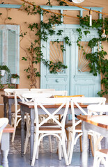 Cozy terrace on a greek street.