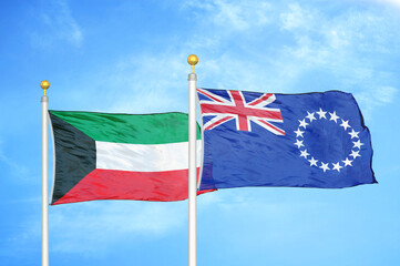 Kuwait and Cook Islands two flags on flagpoles and blue sky