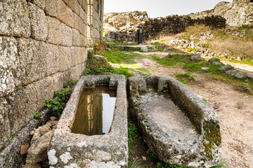 Monsanto village, Portugal. The area around St Michael’s Chapel covered with ancient stone...