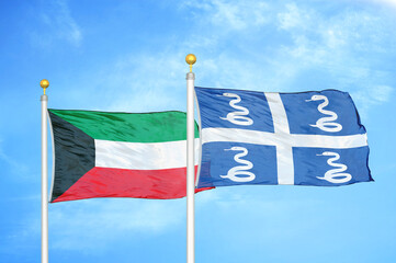 Fototapeta premium Kuwait and Martinique snake two flags on flagpoles and blue sky