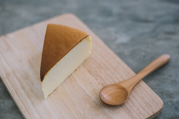 Japanese cheesecake on wood plate