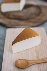 Japanese cheesecake on wood plate