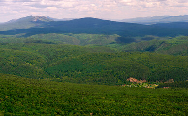 Fototapeta na wymiar Nice panoramic view from the top of the mountain range. Ural mountains. Russia.