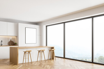 White kitchen corner with bar and poster