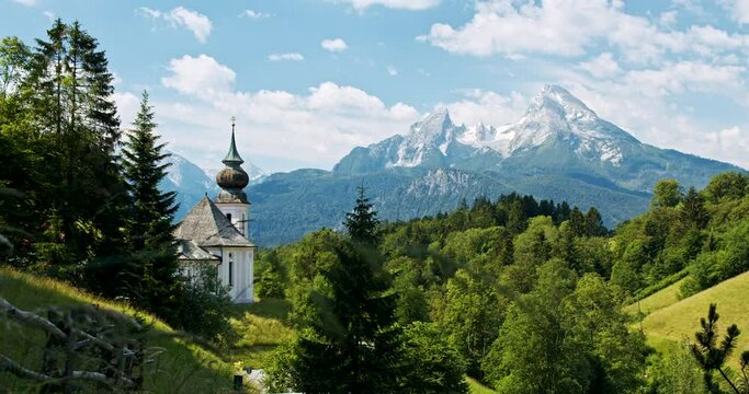 Pilgrimage church Maria Gern, Mount Watzmann and moving clouds in background, Berchtesgaden, Bavaria, Germany, Europe
