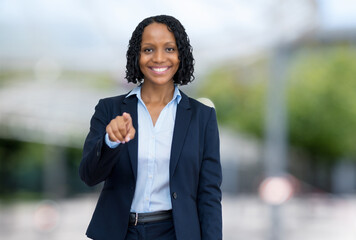 Beautiful african american businesswoman outdoor in the city