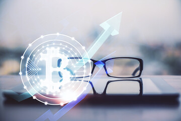 Crypto theme hologram with glasses on the table background. Concept of blockchain. Double exposure.