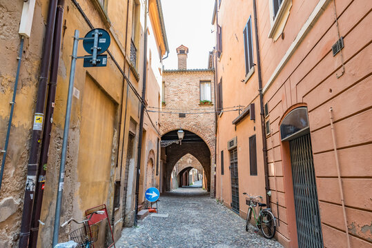 Street view of the Via delle Volte in the medieval center of Ferrara, Italy.