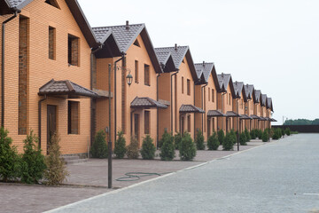 Fototapeta na wymiar New houses. two rows of town houses