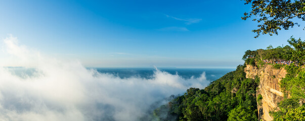 SISAKET, THAILAND - July 26, 2020: tourist See the beautiful cliffs, white mist, at Pha Mor E Daeng National Park, Sisaket Province, Thailand. © Sun Image