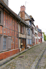 narrow medieval half-timbered street