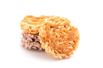 Thai Sweet Crispy Rice Cakes with Cane Sugar Drizzle isolated on white