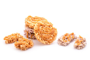 Thai Sweet Crispy Rice Cakes with Cane Sugar Drizzle isolated on white
