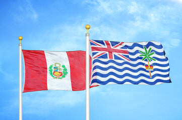 Peru and British Indian Territory two flags on flagpoles and blue sky