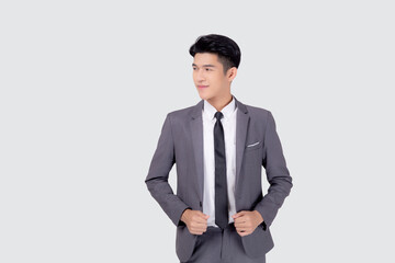 Obraz na płótnie Canvas Portrait young asian businessman in suit smiling with confident and friendly isolated on white background, business man smart with success, manager or executive with handsome and leadership.