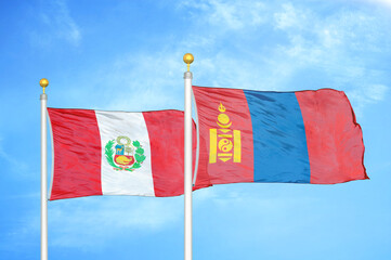 Peru and Mongolia two flags on flagpoles and blue sky