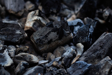 Black hot coal, close-up. Black charcoal background