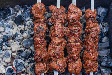 Delicious flavorful shish kebab is prepared on the grill